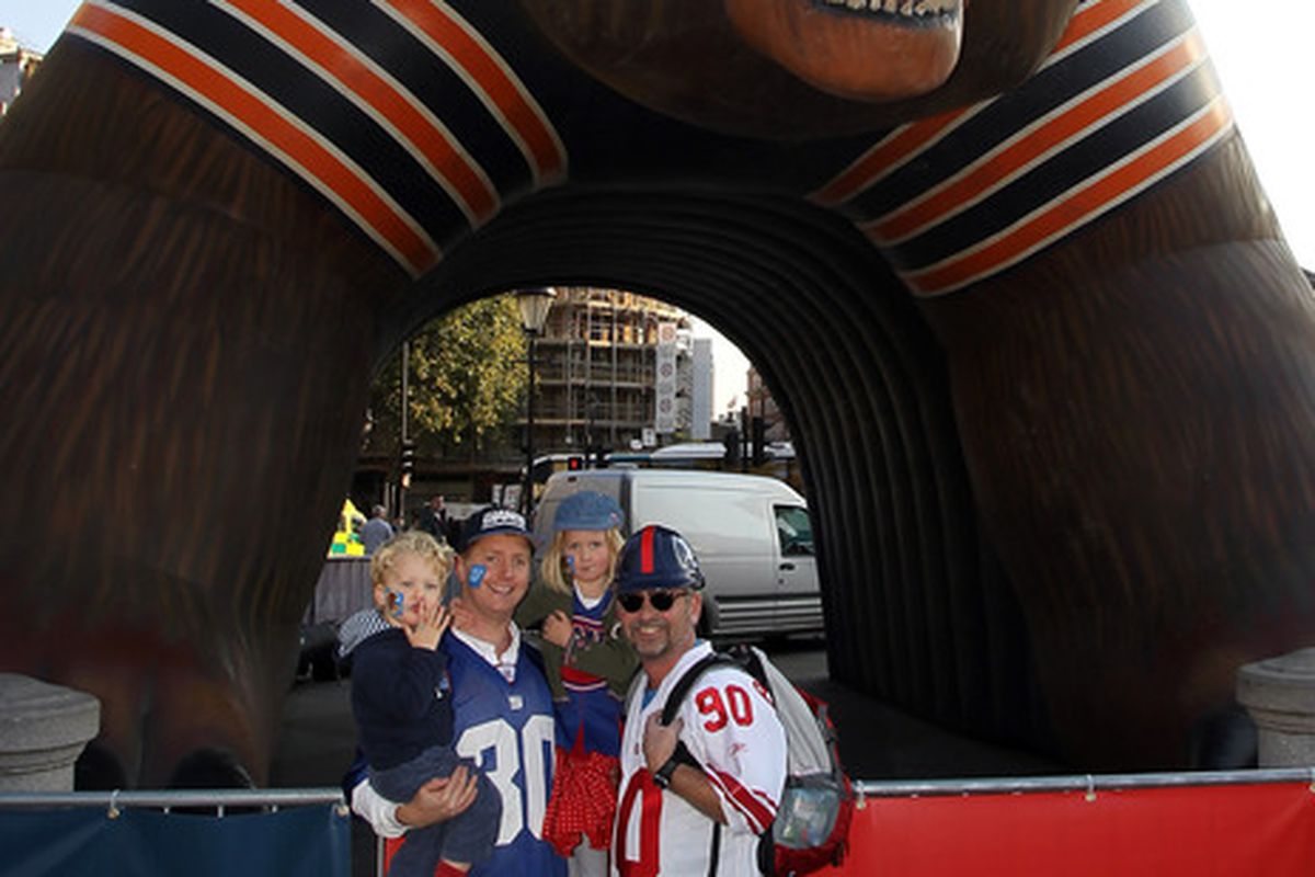 LONDON, ENGLAND - OCTOBER 22:  A general view of fans posing for a picture in front of a blow up of the Chicago Bears during the NFL Fan Rally at Trafalgar Square on October 22, 2011 in London, England.  (Photo by Streeter Lecka/Getty Images)