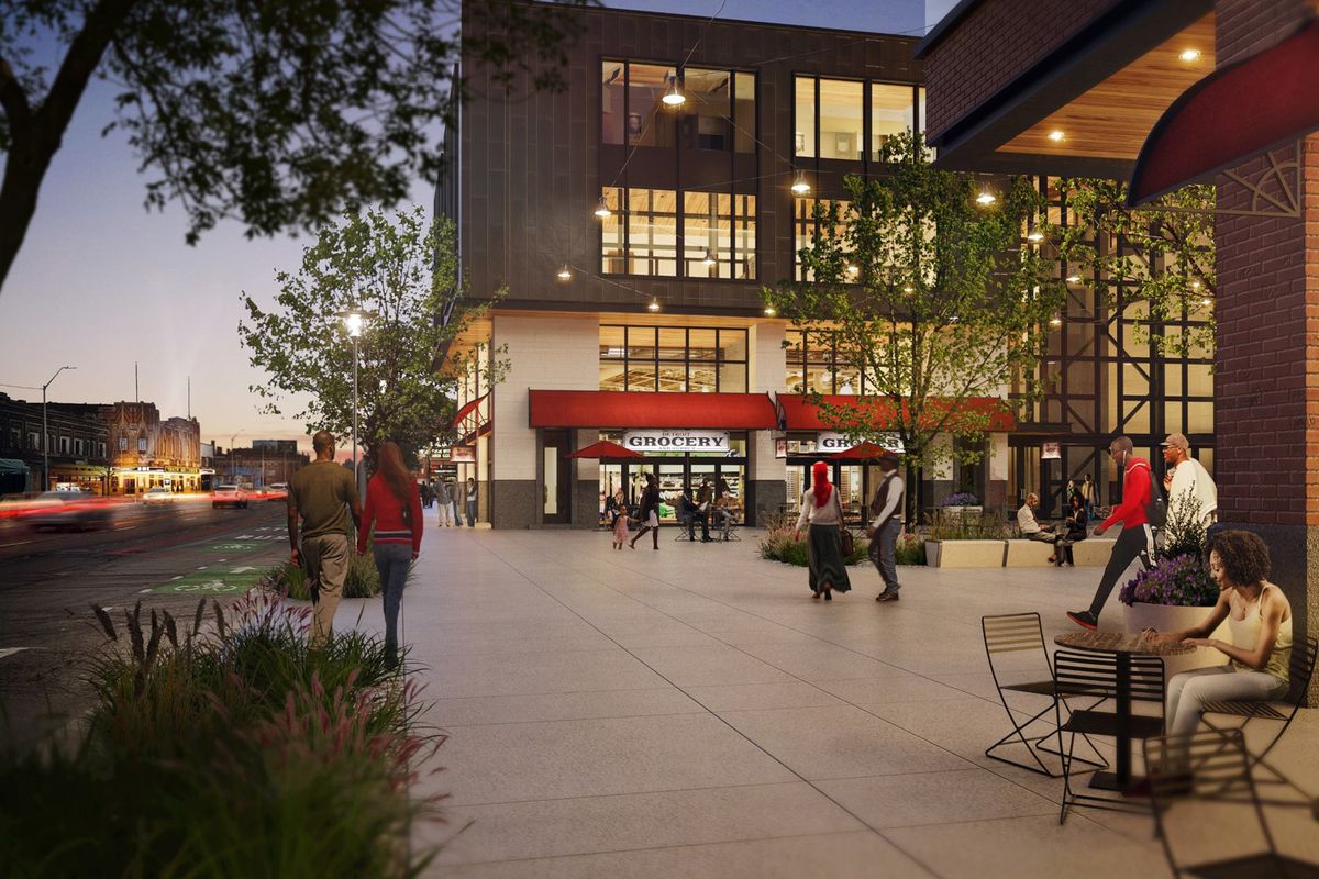 A twilight rendering of a large cement plaza in Jefferson Chalmers with people sitting at tables or walking, surrounded by a several-story building with a red awning.