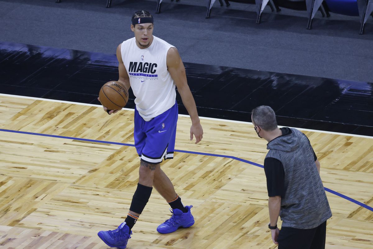 Orlando Magic forward Aaron Gordon gets instruction from an assistant coach during warmups before the game against the Oklahoma City Thunder at Amway Center.