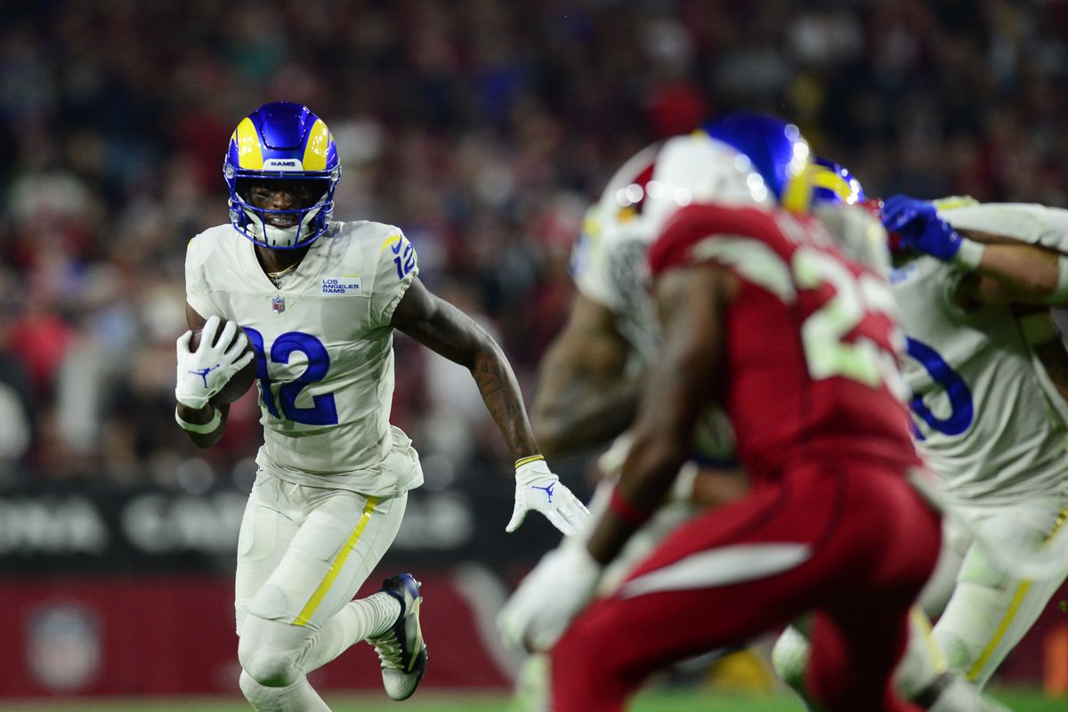 Los Angeles Rams wide receiver Van Jefferson (12) runs with the ball against the Arizona Cardinals during the second half at State Farm Stadium.