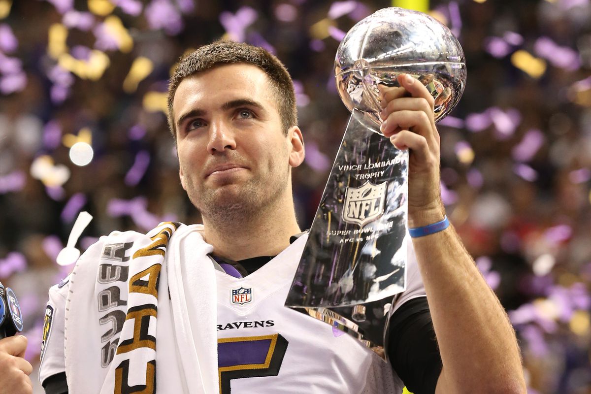 Joe Flacco holds up the Lombardi Trophy during the post-game ceremony after winning Super Bowl XLVII.