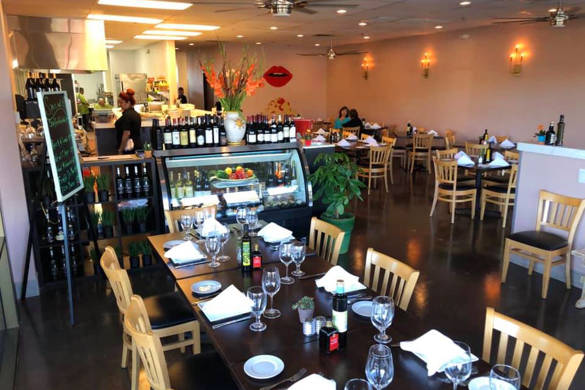 The causal seating area and open kitchen at chef Piero Broglia’s new Italian restaurant in Henderson.