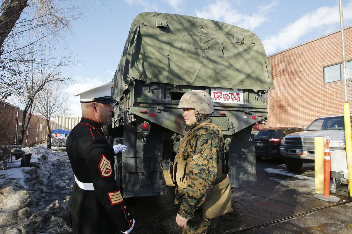 FILE: U.S. Marines deliver their Toys for Tots at The Road Home  in Salt Lake City  Tuesday, Dec. 24, 2013.