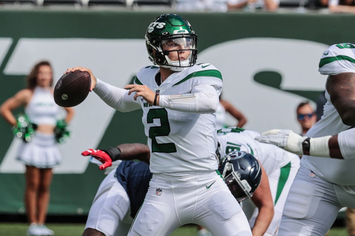New York Jets quarterback Zach Wilson (2) throws the ball against the Tennessee Titans during the first half at MetLife Stadium.
