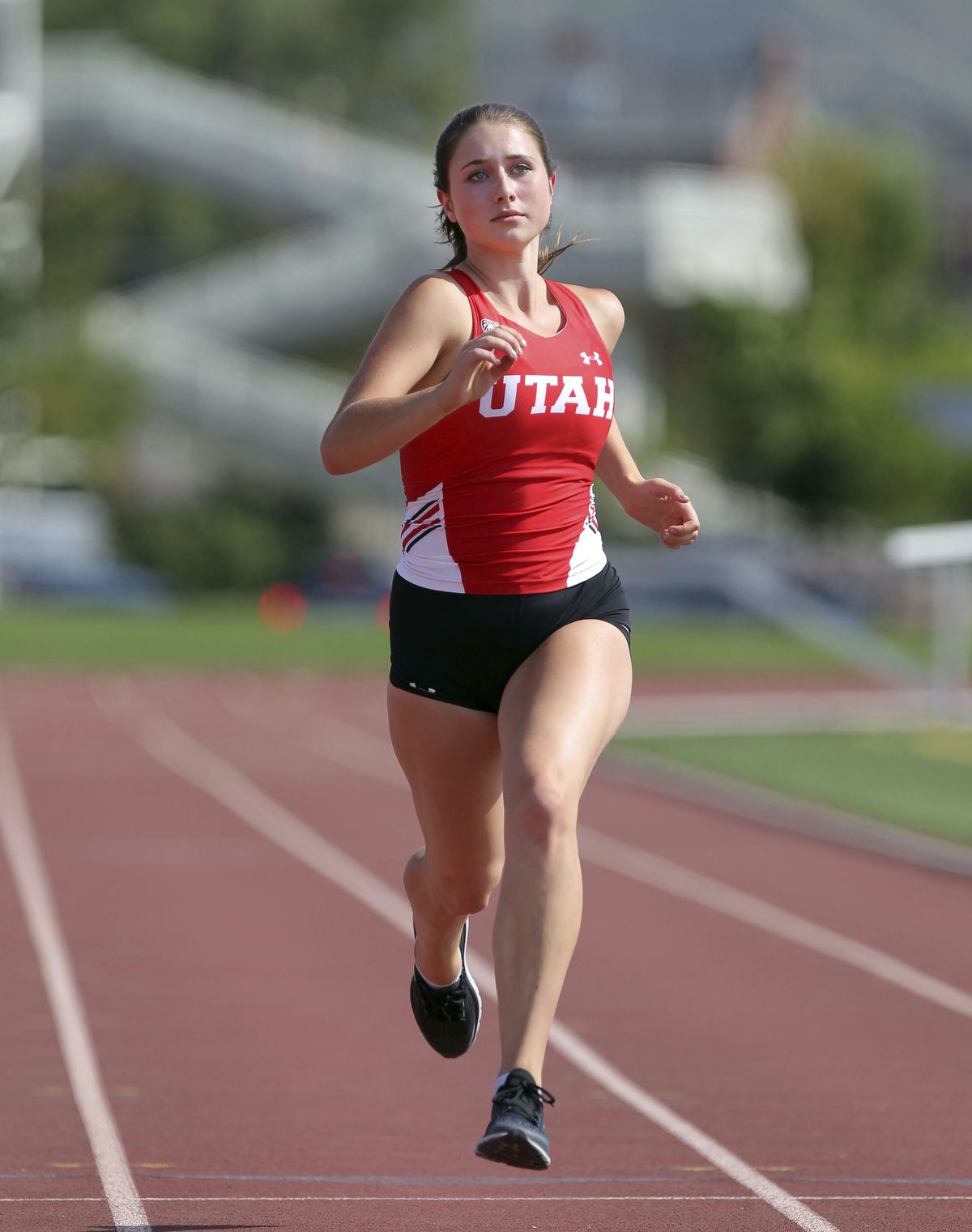 In this Aug. 30, 2017 photo, provided by the University of Utah, shows Lauren McCluskey, a member of the University of Utah cross country and track and field team, runs in Salt Lake City. McCluskey, a University of Utah student was shot and killed on camp