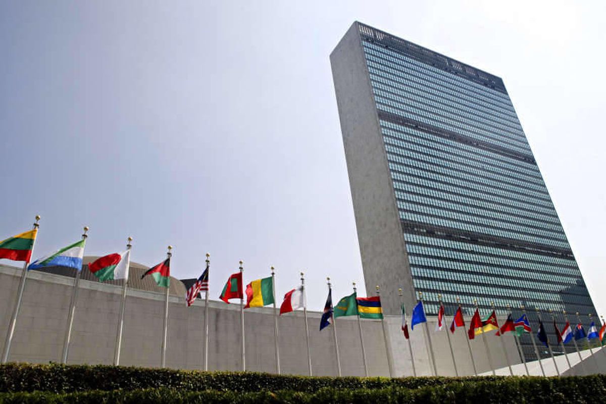 In this Sept. 13, 2005 file photo, the flags of member nations fly outside the General Assembly building at the United Nations headquarters in New York.