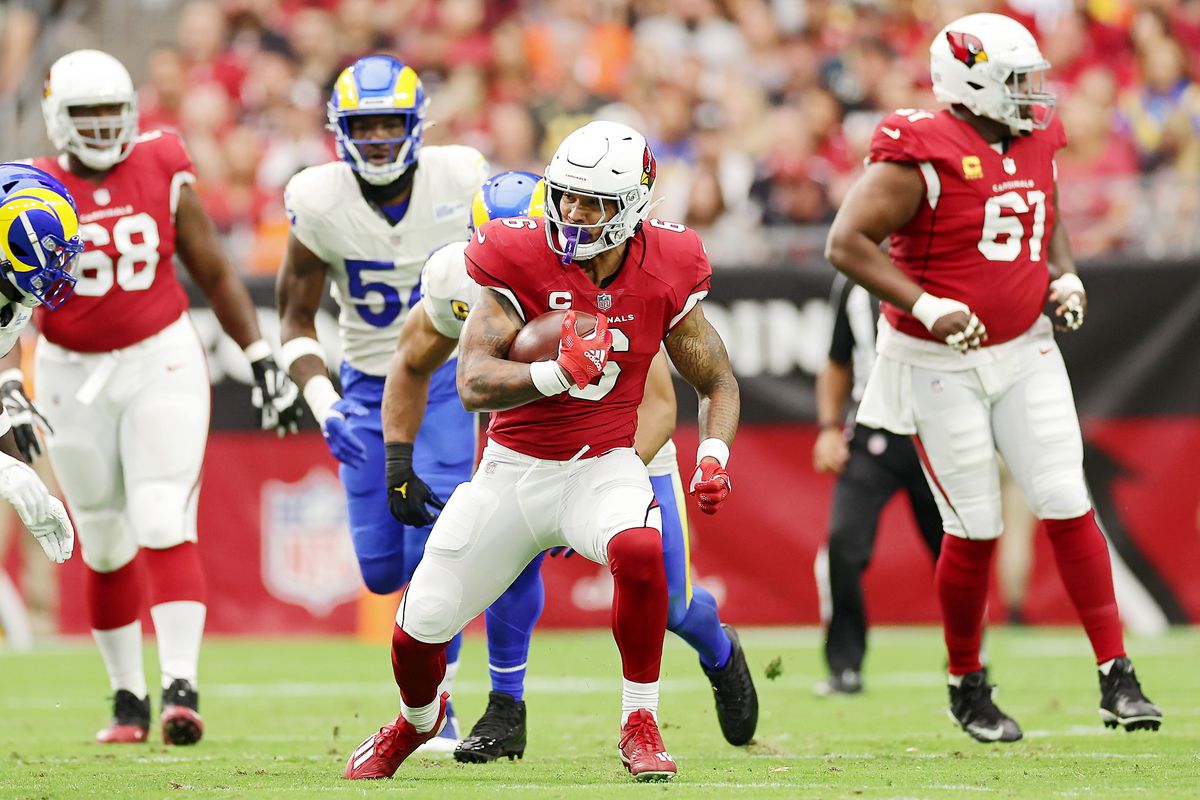 Running back James Conner #6 of the Arizona Cardinals runs with the ball in the second quarter of the game against the Los Angeles Ramsat State Farm Stadium on September 25, 2022 in Glendale, Arizona.