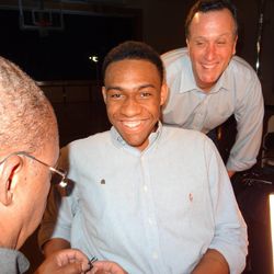 \"Good Morning America\" producer Gary Wynn (background) preparing Jabari Parker for his interview with Katie Couric.