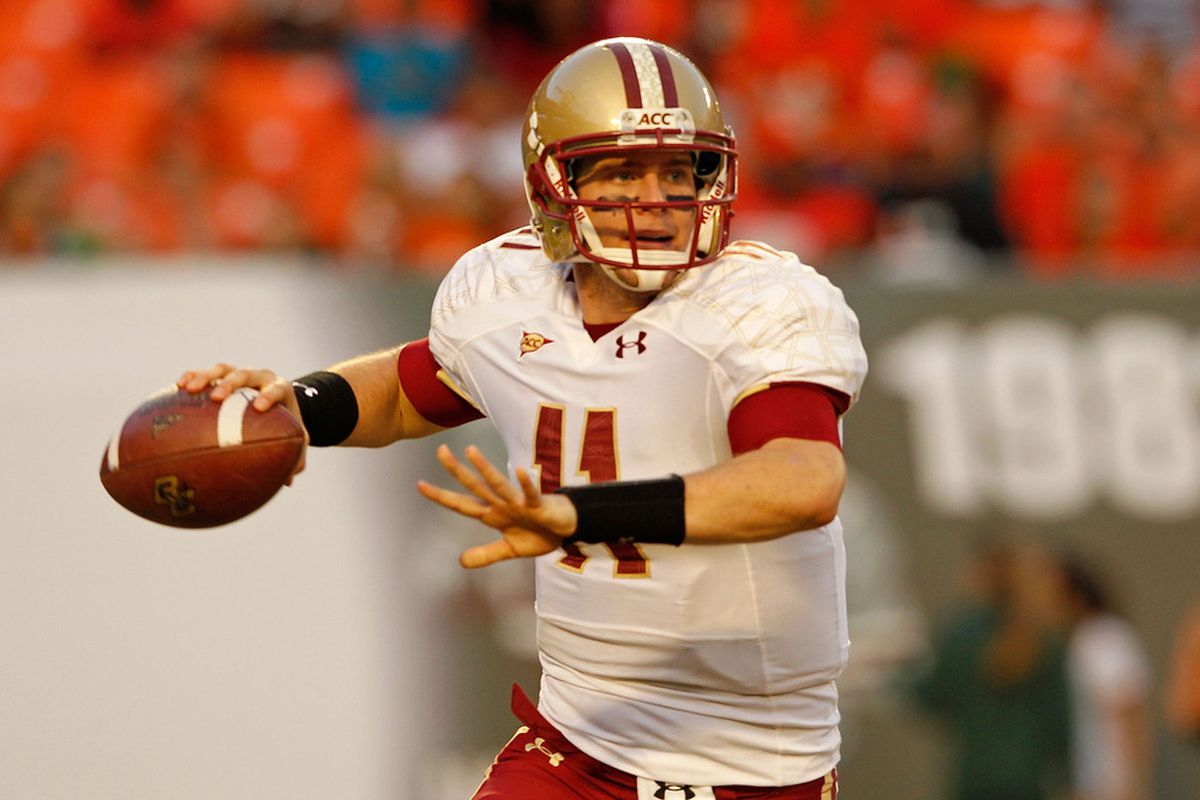 MIAMI GARDENS, FL - NOVEMBER 25:  Chase Rettig #11 of the Boston College Eagles looks to pass during a game against the Miami Hurricanes at Sun Life Stadium on November 25, 2011 in Miami Gardens, Florida.  (Photo by Mike Ehrmann/Getty Images)