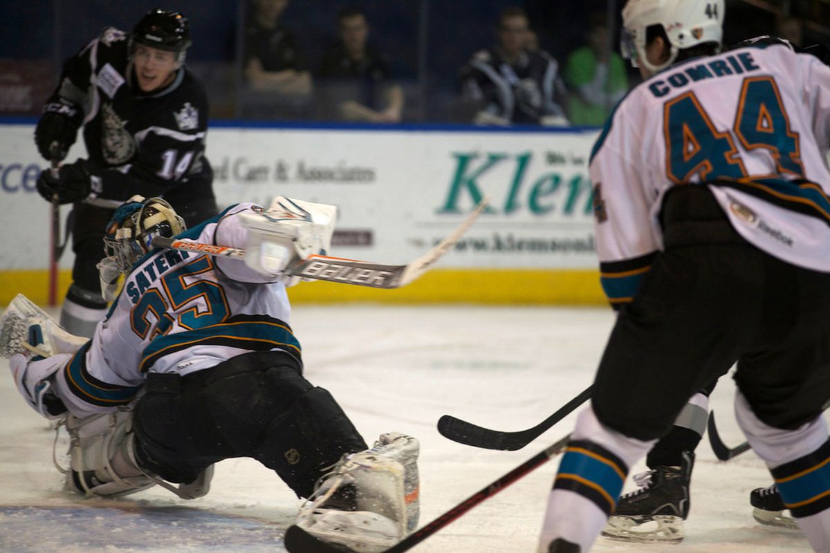 Worcester Sharks goaltender Harri Sateri stretches out to deny Manchester Monarchs left winger Tanner Pearson of a goal Wednesday night at the DCU Center.