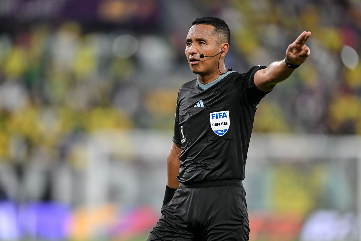 Referee Ivan Barton of El Salvador gestures during the FIFA World Cup Qatar 2022 Group G match between Brazil and Switzerland at Stadium 974 on November 28, 2022 in Doha, Qatar.