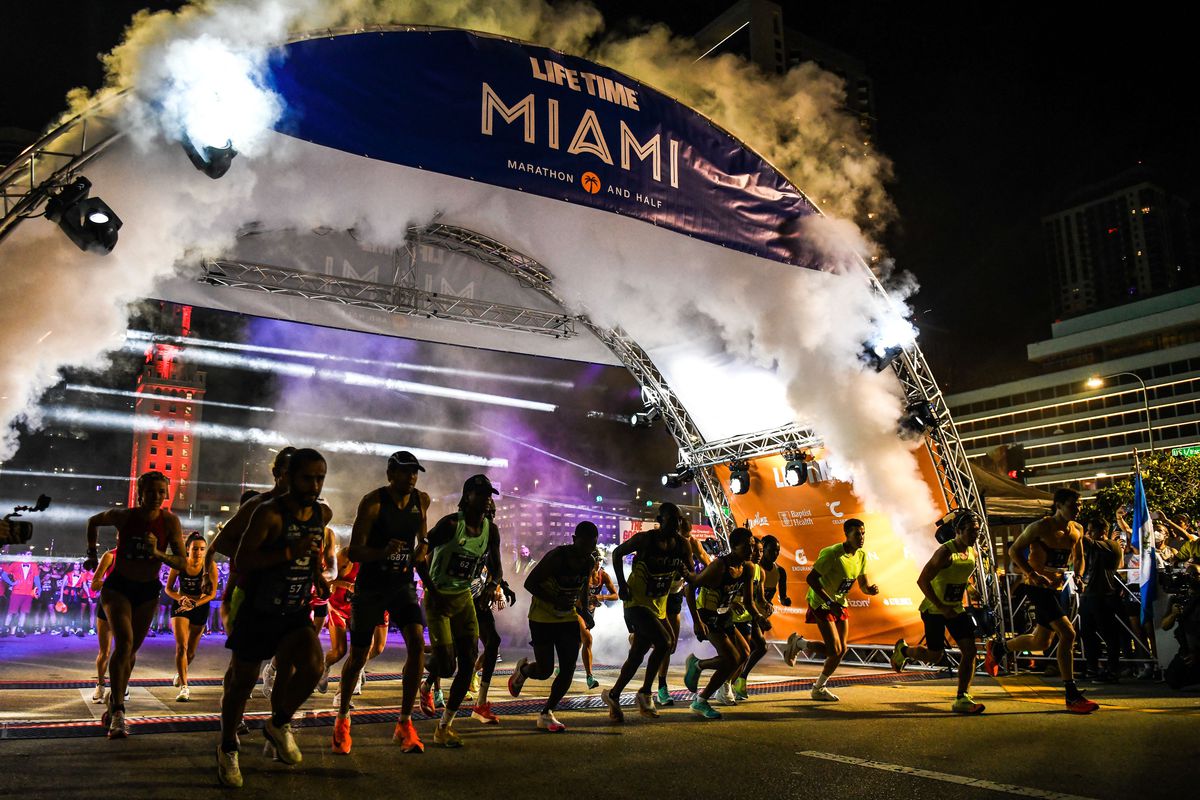 Athletes start at the Life Time Miami Marathon and Half in Miami, Florida on February 6, 2022. - Hosted by the cities of Miami Beach and Miami, Florida, in addition to the county of Miami-Dade, it is one of the quickest growing marathons in the United States that attracts world-class runners from around the globe.