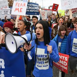 Ermiya Fanaeian, 17, a student at Salt Lake School for the Performing Arts, joins others in the "March for Our Lives" rally in Salt Lake City on Saturday, March 24, 2018. Thousands of protesters marched from West High School to the state Capitol to advocate for stricter gun control laws.