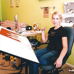 Emily McPhie works in her studio.