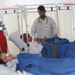 Afghan women injured in an avalanche recover in a hospital in Panjshir province north of Kabul, Afghanistan, Friday, Feb. 27, 2015. The death toll from severe weather that caused avalanches and flooding across much of Afghanistan has jumped to more than 200 people, and the number is expected to climb with cold weather and difficult conditions hampering rescue efforts, relief workers and U.N. officials said Friday. 