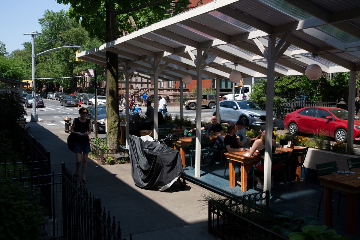 People eat outside a Fort Greene, Brooklyn restaurant, May 19, 2021.