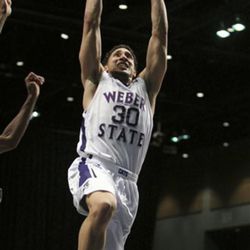 Weber State guard Jeremy Senglin scores against Montana during the second half of an NCAA college basketball game for the championship of the Big Sky men's conference tournament in Reno, Nev., Saturday, March 12, 2016. (AP Photo/Lance Iversen)