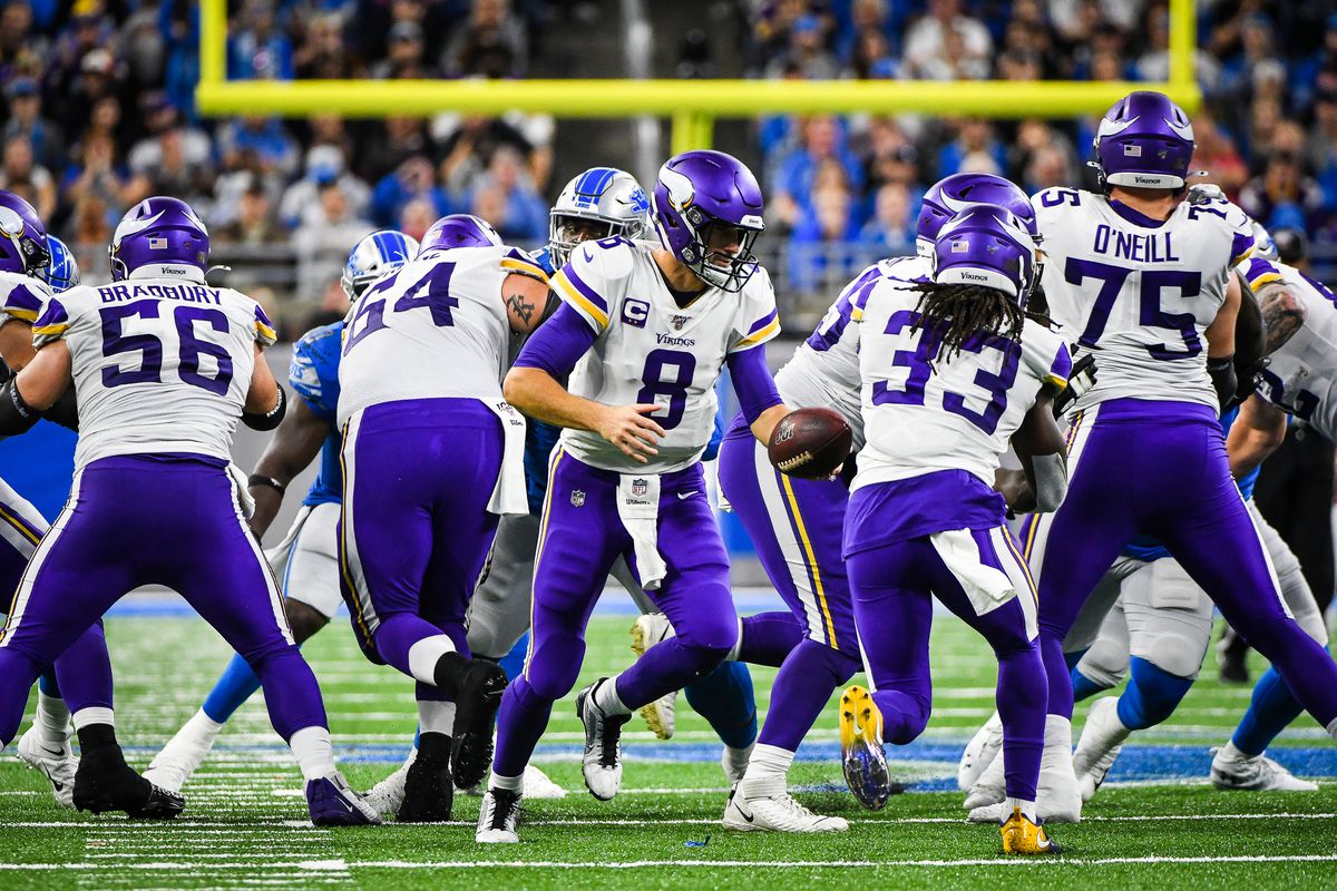 Minnesota Vikings quarterback Kirk Cousins hands off to running back Dalvin Cook during the Detroit Lions versus Minnesota Vikings game on Sunday October 20, 2019 at Ford Field in Detroit, MI.