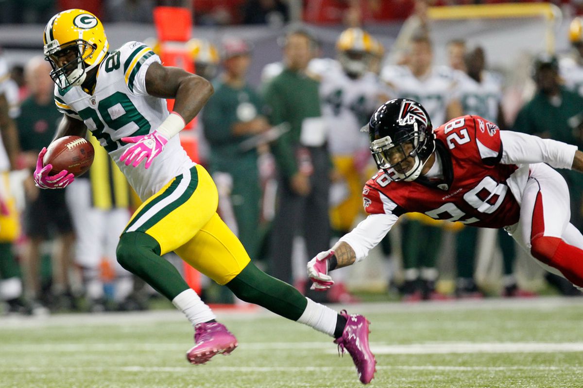 ATLANTA, GA - OCTOBER 09:  James Jones #89 of the Green Bay Packers runs with the ball against Thomas DeCoud #28 of the Atlanta Falcons at Georgia Dome on October 9, 2011 in Atlanta, Georgia.  (Photo by Kevin C. Cox/Getty Images)