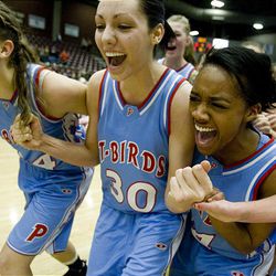 Piutes Shelby Millett, left, Amanda Bagley and Loni Allan celebrate after beating Duchesne High 68-34 in the 1A state girls basketball championship game in Richfield on Feb. 20.