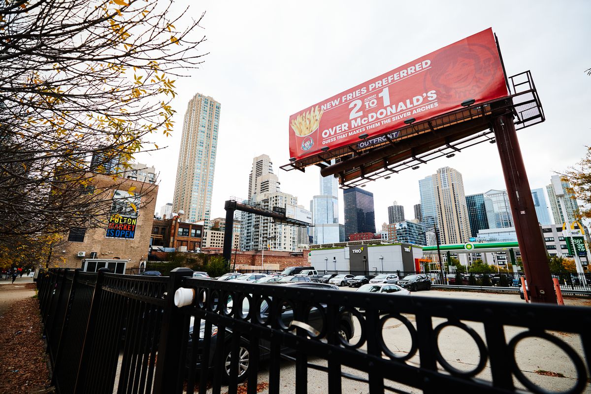 A big billboard advertising Wendy’s fries