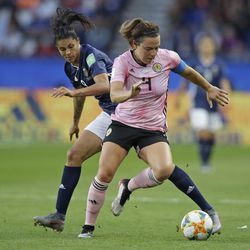 Scotland's Rachel Corsie, right, vies for the ball with Argentina's Sole Jaimes during the Women's World Cup Group D soccer match between Scotland and Argentina at Parc des Princes in Paris, France, Wednesday, June 19, 2019. (AP Photo/Alessandra Tarantino)