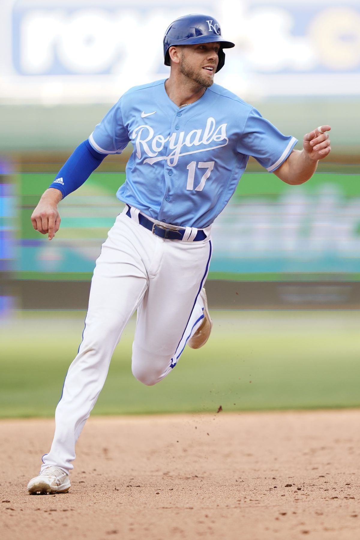 Hunter Dozier #17 of the Kansas City Royals celebrates after defeating the Cleveland Guardians in 10 innings at Kauffman Stadium on April 9, 2022 in Kansas City, Missouri.