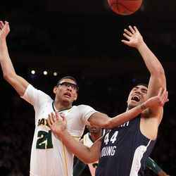 FILE -- In this April 2, 2013 photo, Brigham Young Cougars forward Bronson Kaufusi (44) battles with Baylor Bears center Isaiah Austin (21) for the ball during the NIT Final Four in New York City. BYU lost 76-70.