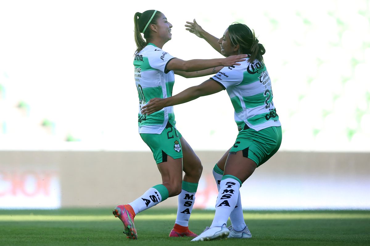 Lia Romero of Santos celebrates after scoring the first goal of hes team with her teammate during the 1st round match between Santos Laguna and Queretaro as part of the Torneo Apertura 2022 Liga MX Femeni at Corona Stadium on July 10, 2022 in Torreon, Mexico.