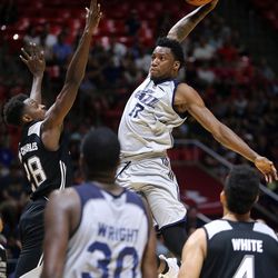 The Utah Jazz's Eric Griffin dunks the ball during a Utah Jazz Summer League basketball game against the San Antonio Spurs at the Huntsman Center in Salt Lake City on Monday, July 3, 2017. Utah won 87-74.