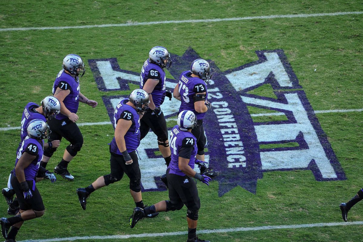 Sep 8, 2012; Fort Worth, TX, USA; A view of the Big 12 logo as the TCU Horned Frogs take the field to face the Grambling State Tigers at Amon G. Carter Stadium. TCU defeated Grambling State 56-0. Mandatory Credit: Jerome Miron-US PRESSWIRE