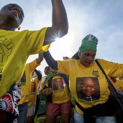 African National Congress (ANC) protesters in support of President Jacob Zuma march to parliament in Cape Town, South Africa, Tuesday Aug. 8, 2017. South Africa's parliament prepared to vote Tuesday on a motion of no confidence in embattled South African President Jacob Zuma that could force him to resign after months of growing anger over alleged corruption. (AP Photo)