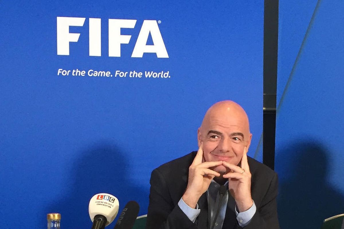 FIFA President, Gianni Infantino listens to a question during a press conference in Cardiff, Wales, Friday, March 4, 2016. The first week of Gianni Infantino's FIFA presidency is set to end with soccer further embracing technology once blocked by Sepp Bla