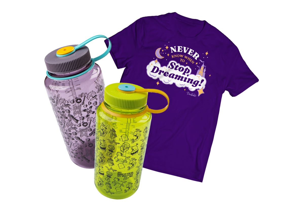 The May McElroy merch items. On the left are two Nalgene water bottles. One is purple with TAZ symbols and the other is green with MBMBaM symbols. On the right is a dark purple tee shirt that says, “Never know when to stop dreaming!”