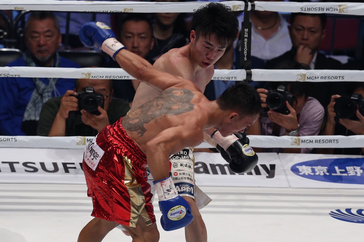 Kenshiro Teraji of Japan(R) competes against Jonathan Taconing of Philippines during the WBC Light Flyweight title bout at Edion Arena Osaka on July 12, 2019 in Osaka, Japan.