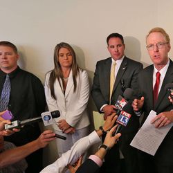 Shaun Cowley, a former West Valley police officer who shot and killed Danielle Willard, 21, in November 2012 with his attorneys Lindsay Jarvis, Bret Rawson and Sam Cassell, left to right, believe he should never have been charged, Monday, July 28, 2014, in Salt Lake City.