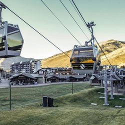FILE - This Tuesday, Nov. 15, 2016 file photo shows a gondola lift at the Vail Ski Resort in Vail, Colo. Ski resorts in Wyoming, Idaho, Colorado, New Mexico and Utah have been forced to delay opening for the Thanksgiving holiday weekend or have few ski runs open because unseasonably warm weather limited their ability to make man-made snow. 