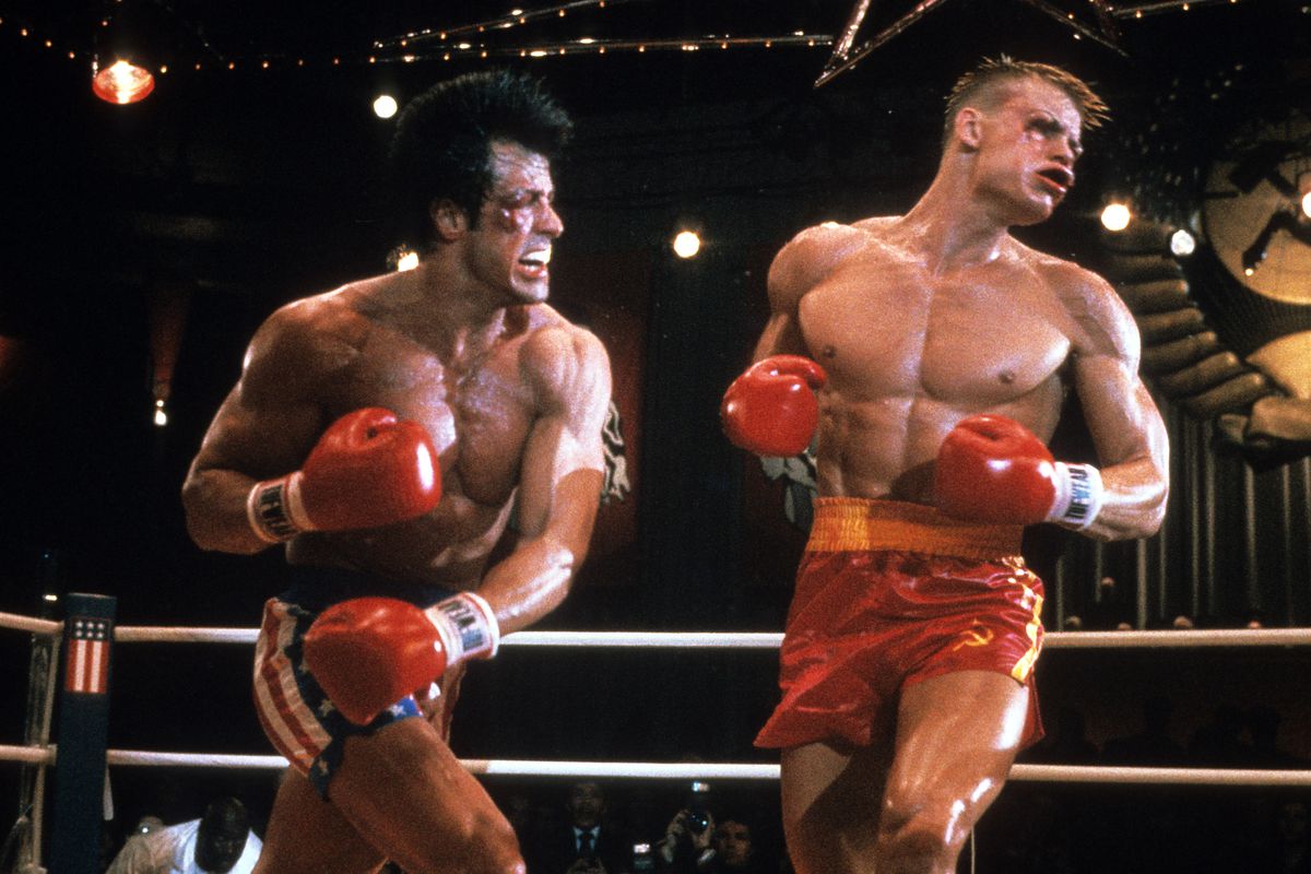 Sylvester Stallone punches Dolph Lundgren in a scene from the film ‘Rocky IV’, 1985.