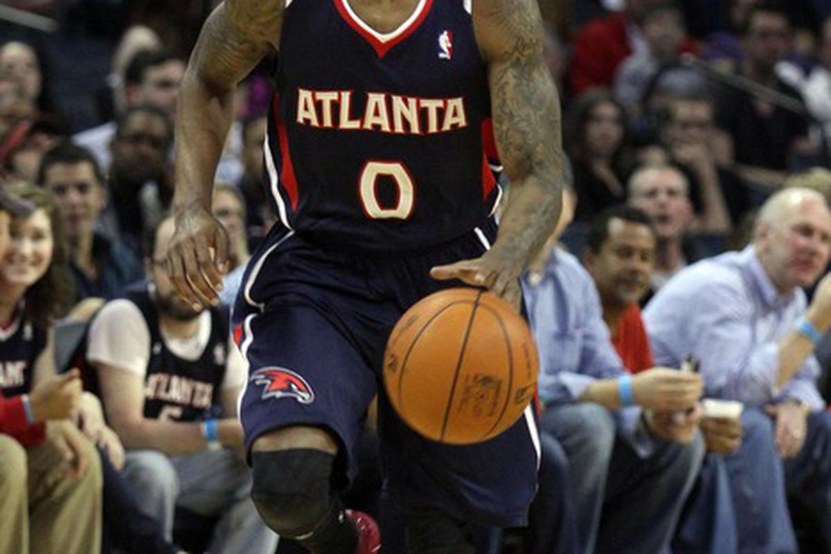 Apr 7, 2012; Charlotte, NC, USA Atlanta Hawks point guard Jeff Teague (0) brings the ball down the court in the first half against the Charlotte Bobcats at Time Warner Cable Arena. Mandatory Credit: Jeremy Brevard-US PRESSWIRE