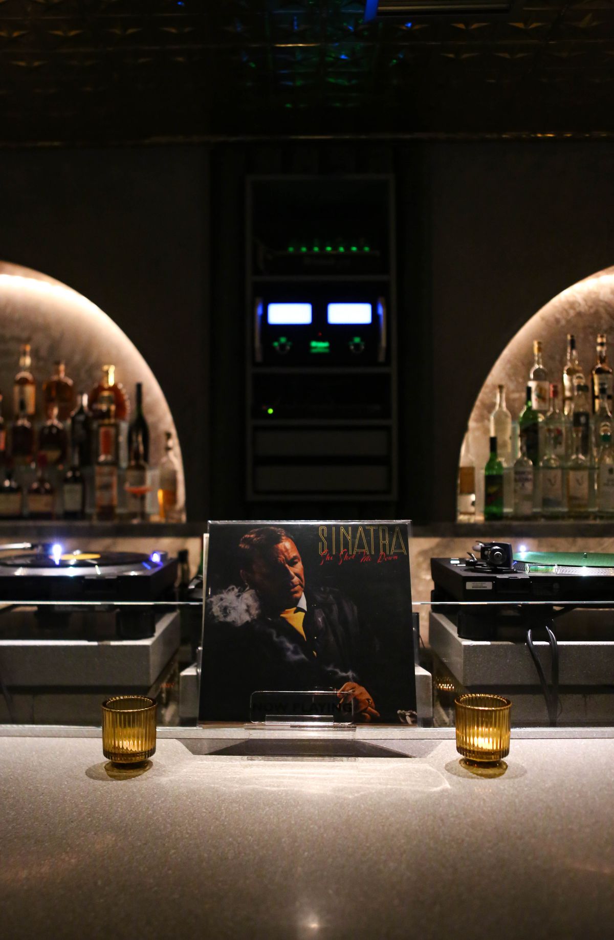 A Frank Sinatra record on a bar.