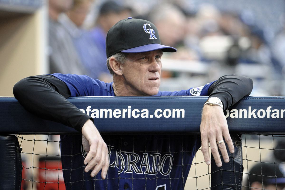 SAN DIEGO, CA - MAY 7:  Jim Tracy #4 manager of the Colorado Rockies looks on during the first inning of a baseball game against the San Diego Padres at Petco Park on May 7, 2012 in San Diego, California.  (Photo by Denis Poroy/Getty Images)
