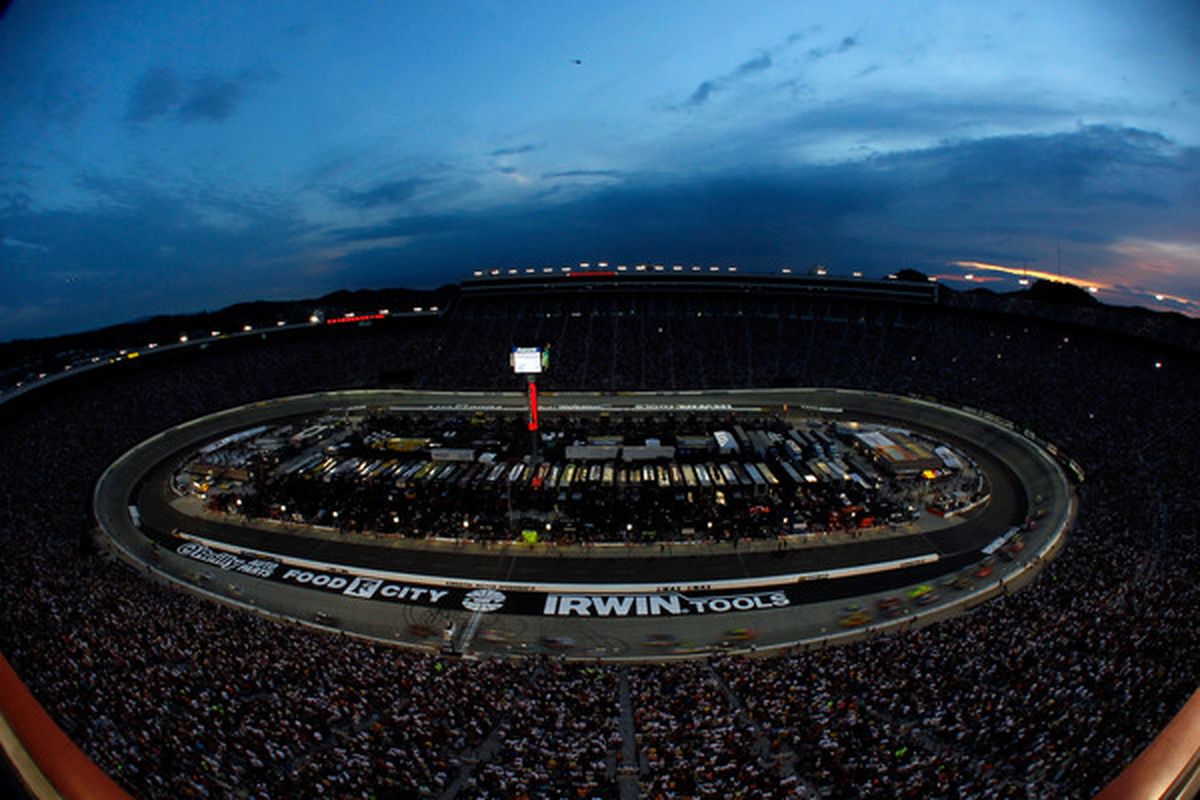 BRISTOL TN - AUGUST 21:  Cars race during the NASCAR Sprint Cup Series IRWIN Tools Night Race at Bristol Motor Speedway on August 21 2010 in Bristol Tennessee.  (Photo by Todd Warshaw/Getty Images)