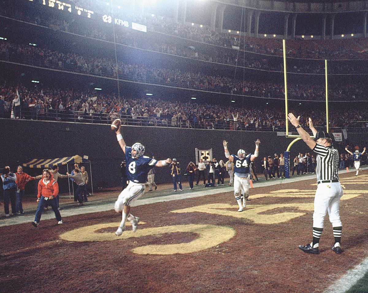 Steve Young celebrates in the end zone after scoring the game-winning touchdown to beat Missouri in the 1983 Holiday Bowl.