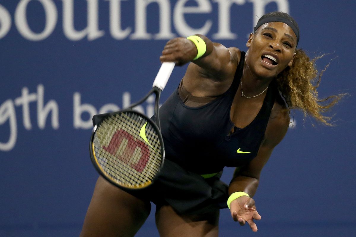 Serena Williams serves to Maria Sakkari of Greece during the Western &amp; Southern Open at the USTA Billie Jean King National Tennis Center on August 25, 2020 in the Queens borough of New York City.