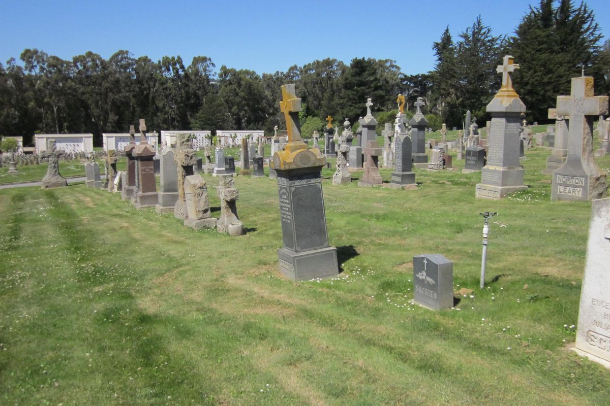 Leaning tombstones in Holy Cross Cemetery in Colma.