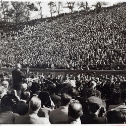 President Harry S. Truman addresses a Brigham Young University crowd in October 1952 while campaigning in support of Adlai Stevenson's presidential bid. LDS Church President David O. McKay (white hair visible at lower center) sat on the platform at Truman's right.