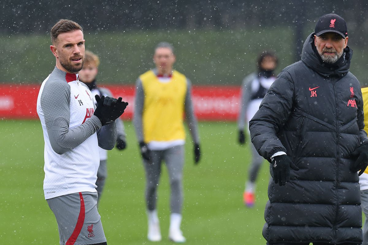 Jordan Henderson and Jurgen Klopp manager of Liverpool during a training session at AXA Training Centre on March 09, 2023 in Kirkby, England.