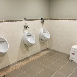 Due to likely heavy beer drinking on site, co-owner Lawrence Harbin decided to add a third urinal in the men’s room.