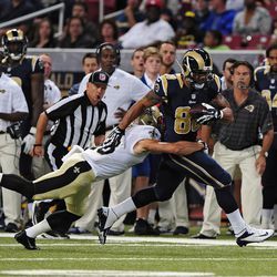 Aug 8, 2014; St. Louis, MO, USA; St. Louis Rams tight end Lance Kendricks (88) carries the ball as New Orleans Saints safety Vinnie Sunseri (43) attempts to tackle during the first half at Edward Jones Dome. Mandatory Credit: Jeff Curry-USA TODAY Sports
