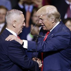 President-elect Donald Trump introduces retired Marine Corps Gen. James Mattis as his appointed Secretary of Defense while speaking to supporters during a rally in Fayetteville, N.C., Tuesday, Dec. 6, 2016. 